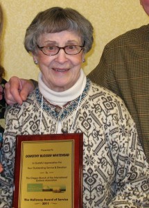 Picture of Dorothy Whitehead accepting an award in 2011